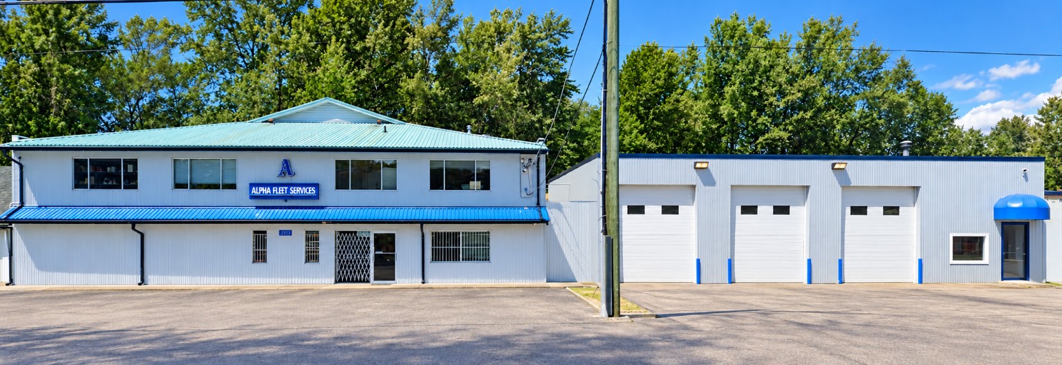 Full panoramic view of Alpha Fleet Services building and service facility in Port Coquitlam